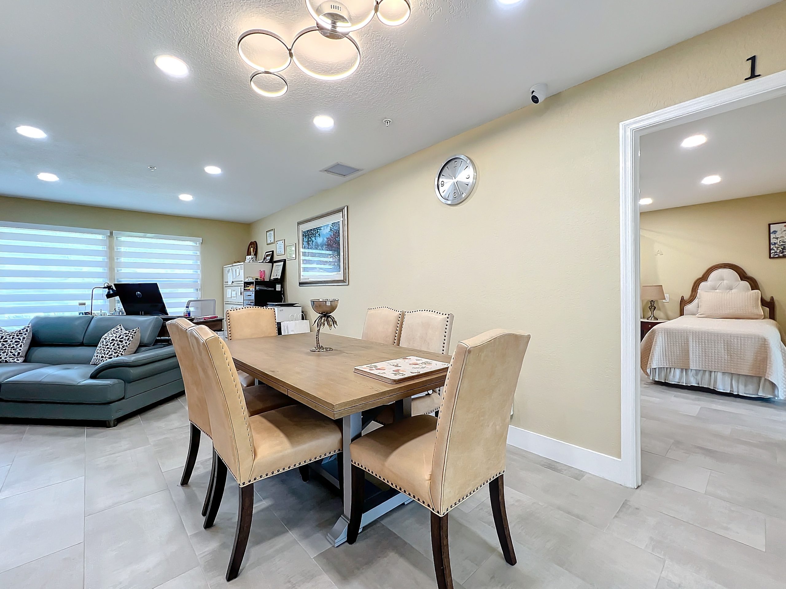 Beautifully decorated dining room area adjacent to resident suites at Abundant Care Residence in Wellington, FL